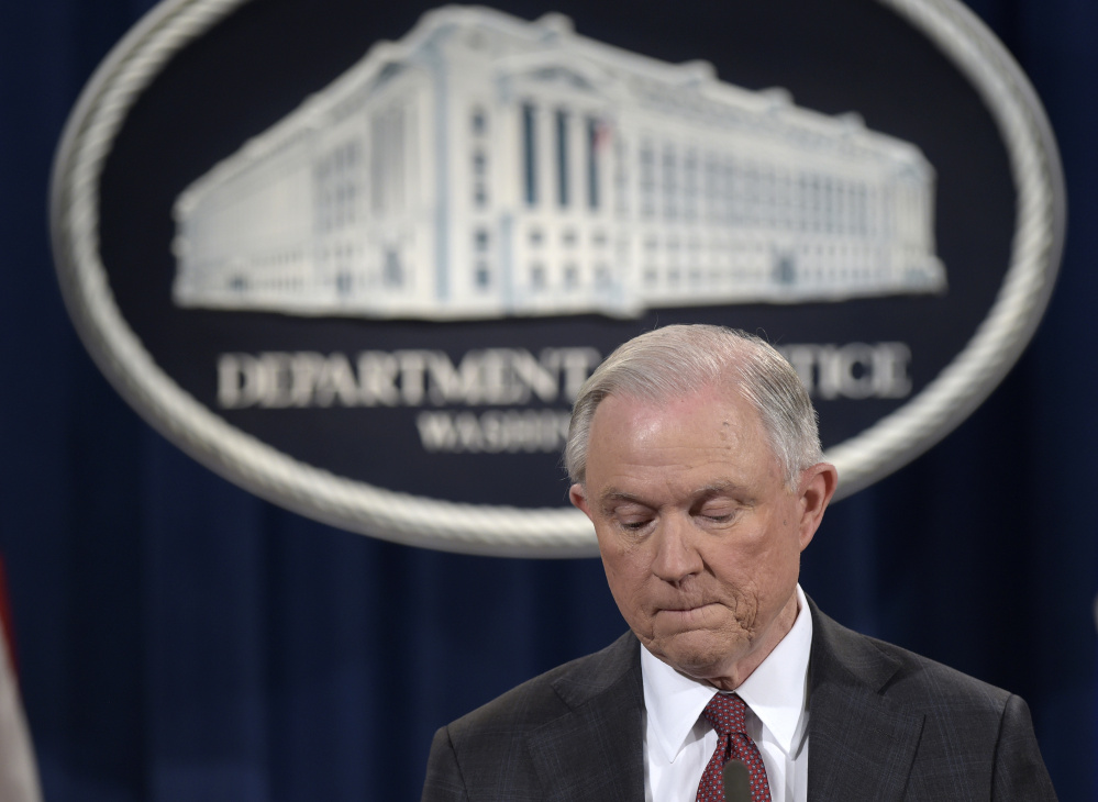 Attorney General Jeff Sessions said at a news conference Thursday that he was removing himself from investigations related to the presidential campaign on the advice of Justice Department ethics officials.