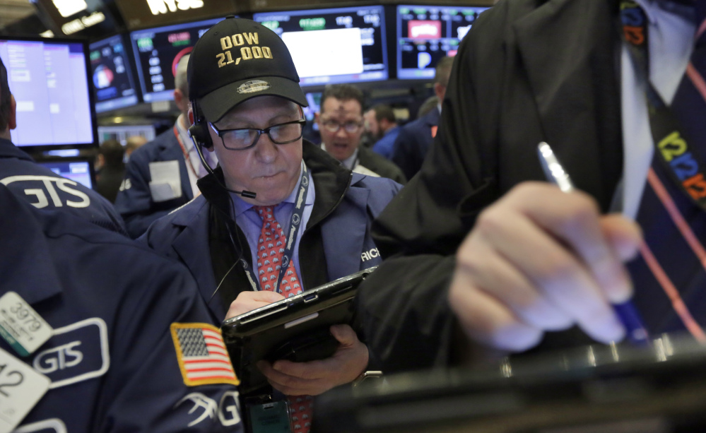 Trader Richard Cohen works on the floor of the New York Stock Exchange. The Standard & Poor's index has jumped 11.3 percent since Election Day, packing more gains into four months than it has achieved in four of the past six full years.