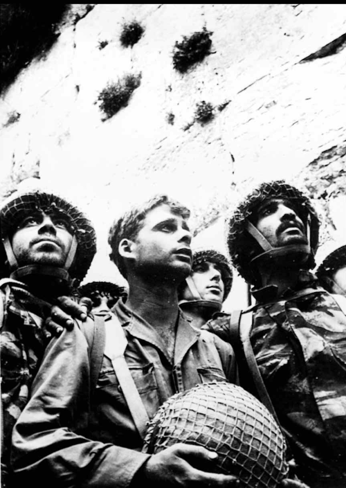 Israeli soldiers take their first look at the Jewish religion's holiest place, the Western Wall in the old city of Jerusalem, after it was captured from Jordan on June 8, 1967.