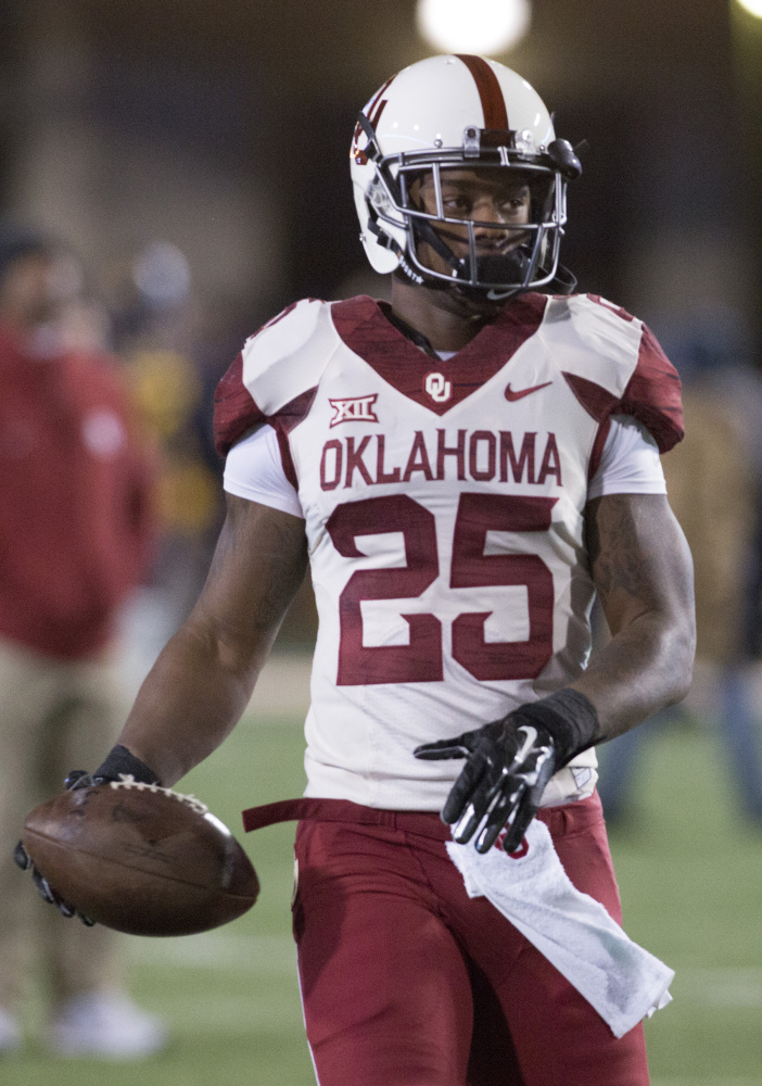 Oklahoma running back Joe Mixon was not invited to the NFL combine because of 2014 video showing him punching a female student.