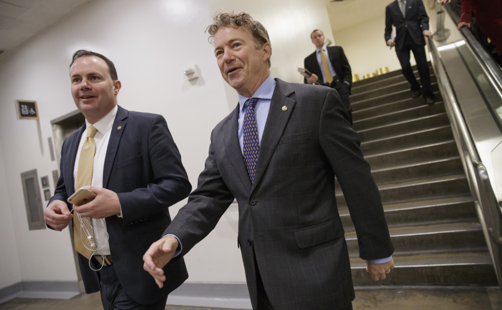 Republican senators Rand Paul (right), Mike Lee (left) and Ted Cruz (not pictured) might try to force their party to settle for nothing less than the full repeal they demanded and received in 2015 — when they knew then-President Obama would veto the measure.