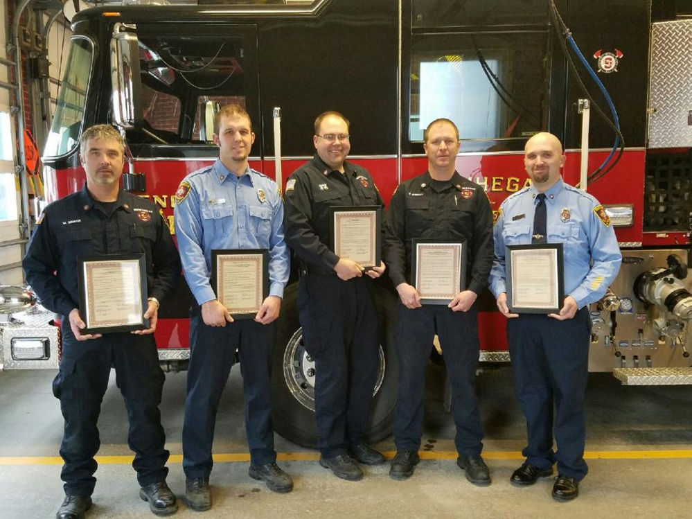 Members of the Skowhegan Fire Department's Rapid Intervention Team were honored Tuesday for bravery with a proclamation from town's selectmen. They are, from left, Capt. Mike Savage and firefighters Devin Provencal, Matthew Quinn, Ty Strout and Josh Corson.
