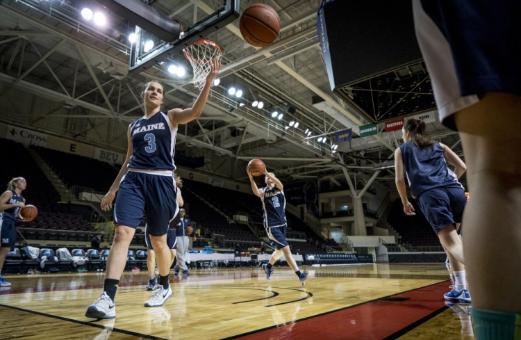 UMaine players warm up before a game in the America East Women's Basketball Tournament in Portland in March. The Cross Insurance Arena will host tournament games again in 2018, and conference officials said Monday that they would consider bringing the tournament back to Portland in later years. 