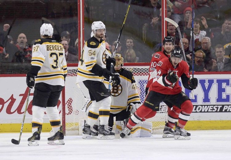 The Senators' Jean-Gabriel Pageau celebrates a goal on Bruins goaltender Tuuka Rask in the first period Monday night as the Senators jump out to an early 2-0 lead.