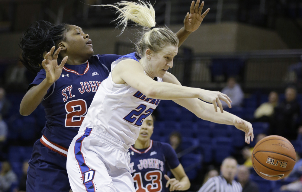 DePaul's Brooke Schulte, right, loses the ball against St. John's Jade Walker during the first half of a 59-41 win by DePaul in a semifinal game of the Big East tournament Monday at the Al McGuire Center in Milwaukee.