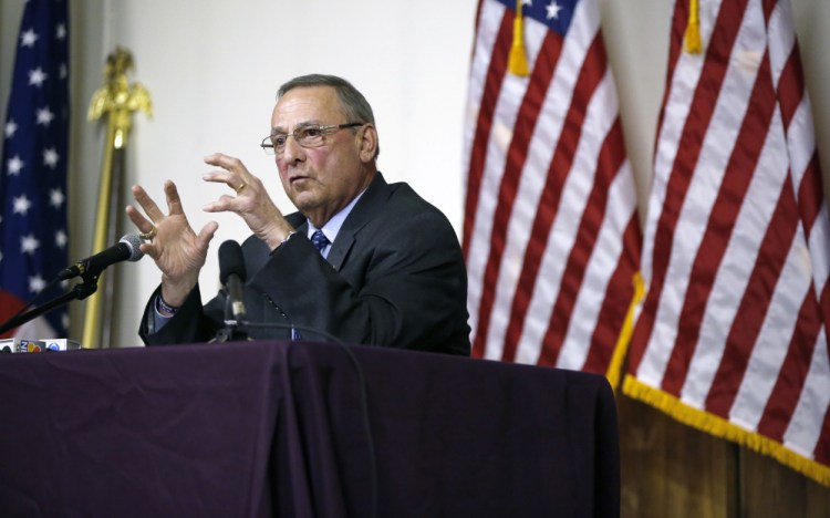 Gov. Paul LePage speaks during Wednesday night's town hall meeting at Amvets Post 2 in Yarmouth. Several hundred people turned out.