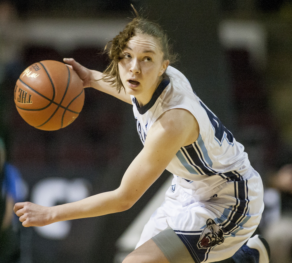 UMaine's Sigi Koizar brings the ball up court while evading a Binghamton press during an opening-round game of the America East tournament at the Cross Insurance Arena last Saturday.