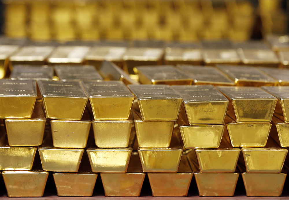 Gold sits in a vault in West Point, N.Y. The Federal Reserve's economic stimulus and a recovery in corporate profits have led a stock market rebound over the past eight years.