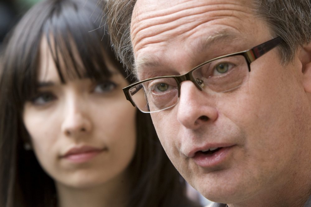 Pot stores owned by Marc Emery and his wife, Jodie, left, were raided Thursday.