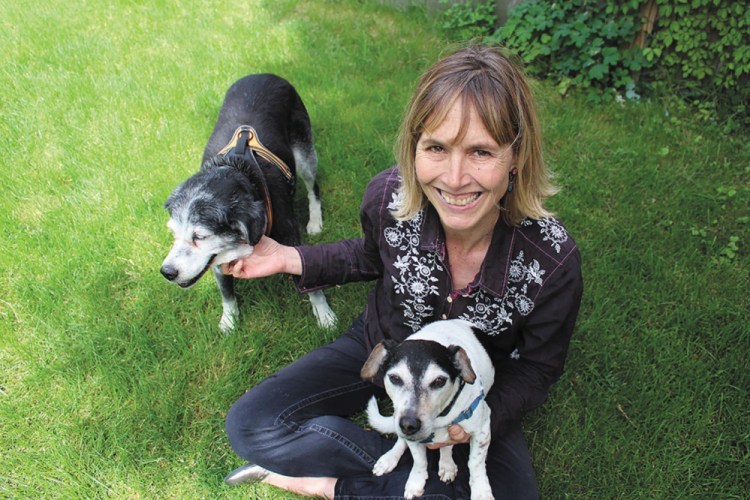 Amy Sutherland with her rescue dogs, Penny Jane, left, and Walter Joe.