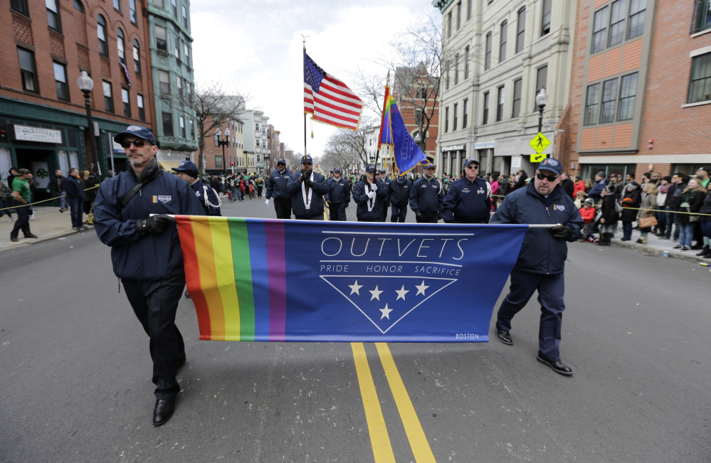 Members of OutVets, a group of gay military veterans, march in the 2016 St. Patrick's Day parade in Boston. Parade organizers reversed their decision to ban the group this year.
