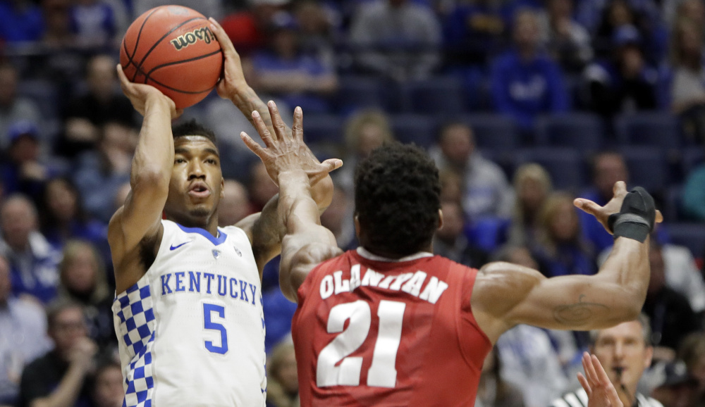 Malik Monk, who finished with 20 points for Kentucky, shoots over Bola Olaniyan of Alabama during the first half of Kentucky's 79-74 victory in the Southeastern Conference semifinals Saturday. The Wildcats will take on Arkansas in the championship game Sunday.
