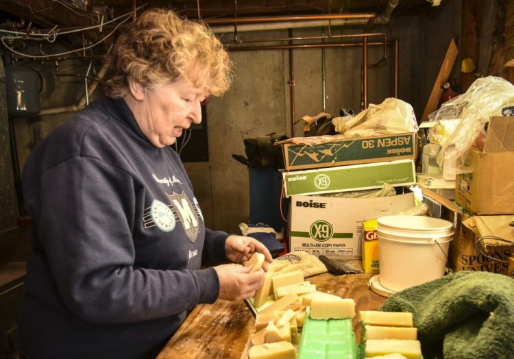 For Elaine Briggs of Wayne, aging in place means continuing to do the hobbies and crafts she enjoys doing in her own home. She is shown Sunday with her with spearmint- and lavender-infused soap that she made in the basement of her home.