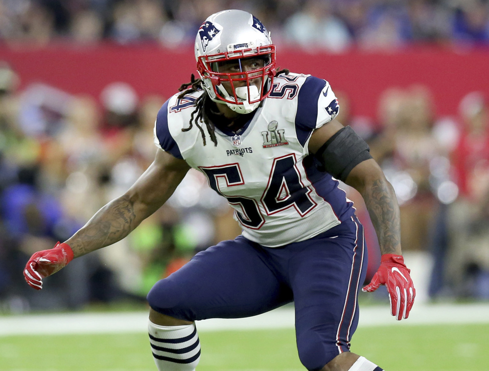 Dont'a Hightower, who helped the New England Patriots win the Super Bowl in February, has reportedly signed a four-year contract to return to New England. He was one of the most coveted linebackers avalable in free agency. (Associated Press/Gregory Payan, File)