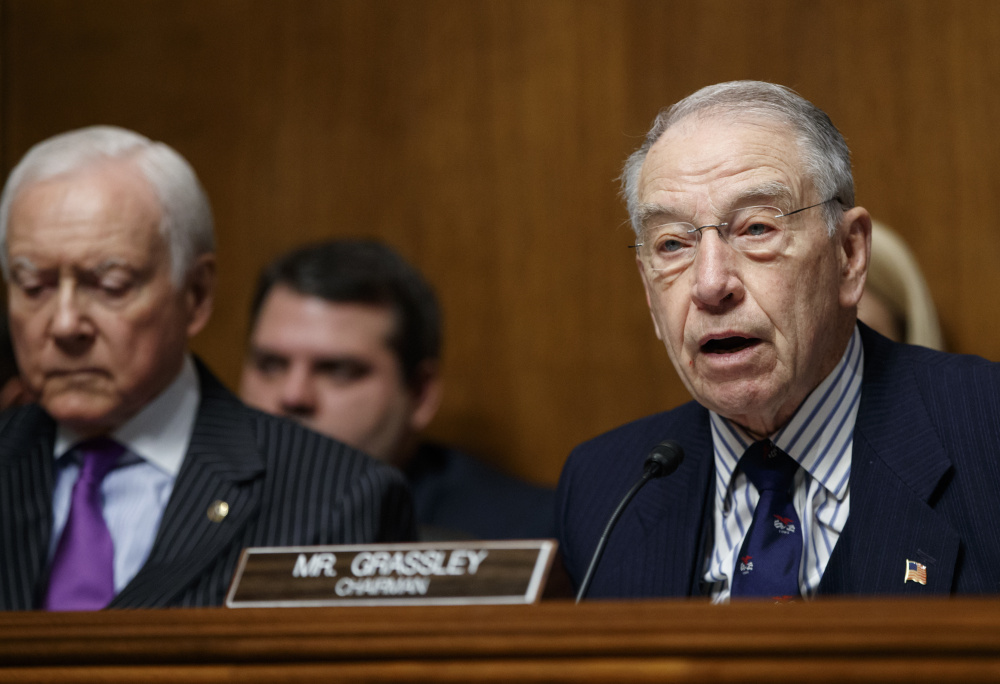 Senate Judiciary Committee Chairman Sen. Chuck Grassley, R-Iowa, right, says he has been having trouble getting information.