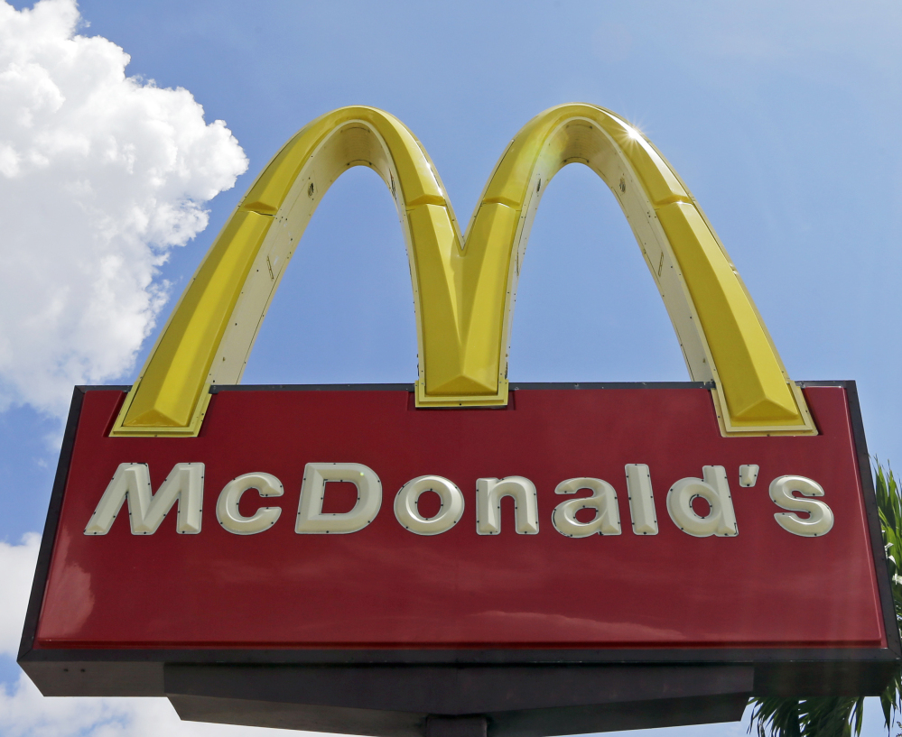 A McDonald's sign is displayed in Miami. On Thursday, McDonald's said its Twitter account was "compromised" after it appeared to send a message disparaging President Trump.