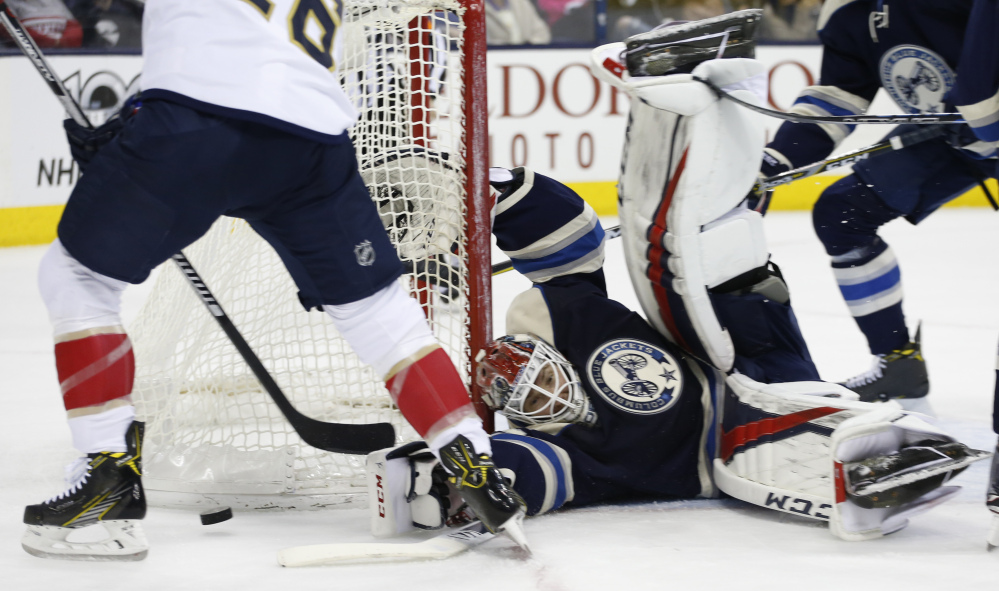 Sergei Bobrovsky, goalie for the Columbus Blue Jackets, sprawls to make a save against the Florida Panthers during the first period of a 2-1 win by the Blue Jackets on Thursday night at Columbus, Ohio.