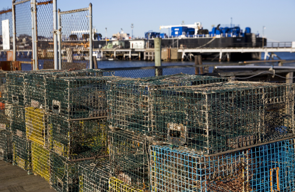 SOUTH PORTLAND, ME - JANUARY 16: Lobster traps sot on the Portland Street Pier, a city-owned pier that is one of the waterfront piers the city of South Portland is taking steps to revitalize in the hope of encouraging aquaculture enterprises. (Photo by Brianna Soukup/Staff Photographer)