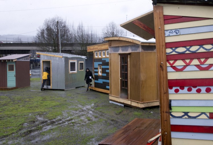 Examples of the Kenton Neighborhood Tiny Home Pilot houses in Portland, Ore. Tiny houses will be located in willing participants' backyards.