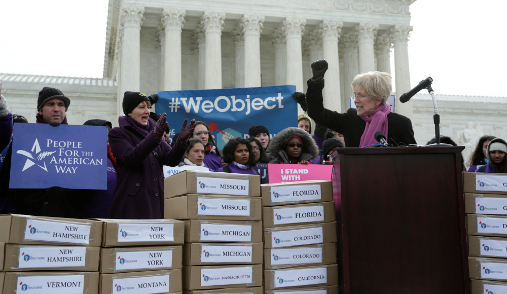 Massachusetts Sen. Elizabeth Warren speaks in front of the U.S. Supreme Court on Wednesday to kick off the delivery of petitions calling on senators to oppose Supreme Court nominee Judge Neil Gorsuch.