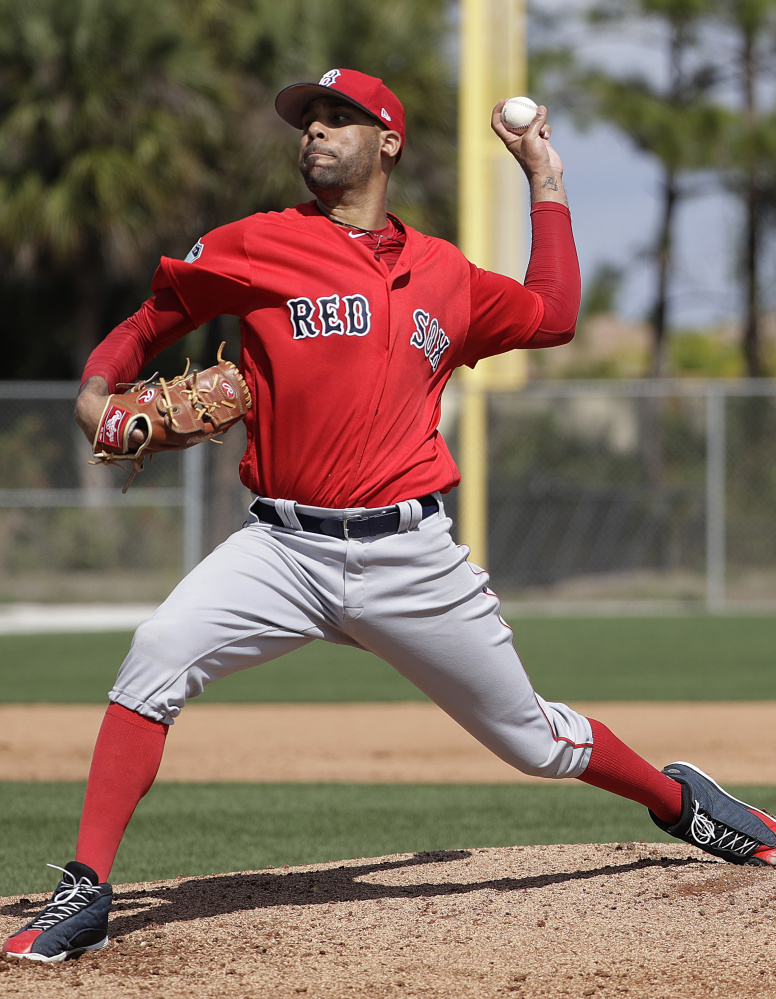 Boston Red Sox pitcher David Price throws a live batting session at a spring training baseball workout in Fort Myers, Fla., in February. The Sox ace has yet to pitch in a spring training game.