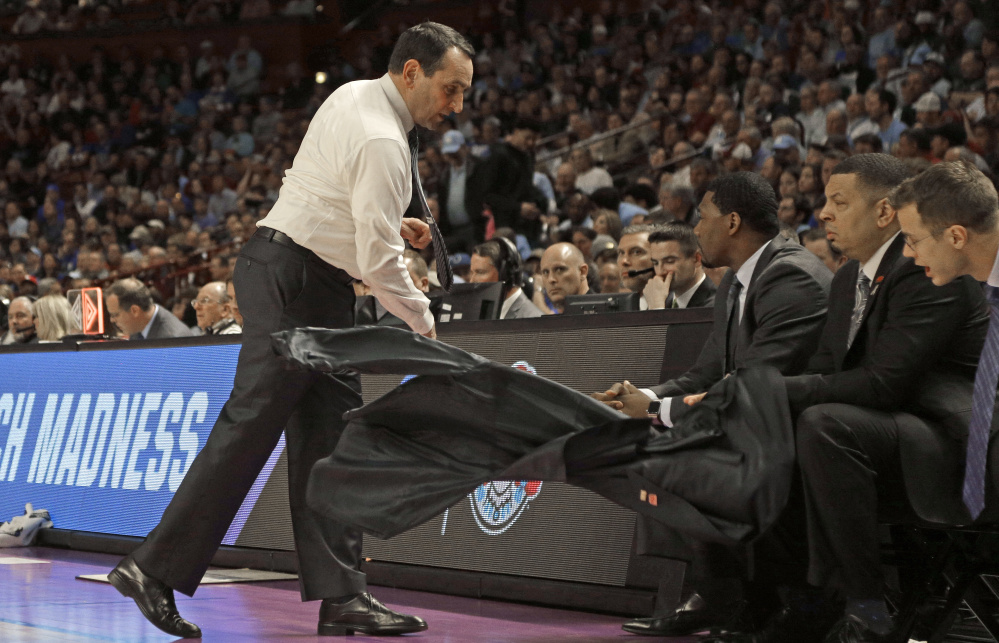 The jacket went flying in the first half and before the night was over, the entire season was out the window as Coach Mike Krzyzewski watched his Duke team, seeded second in the East, fall Sunday to South Carolina, 88-81.