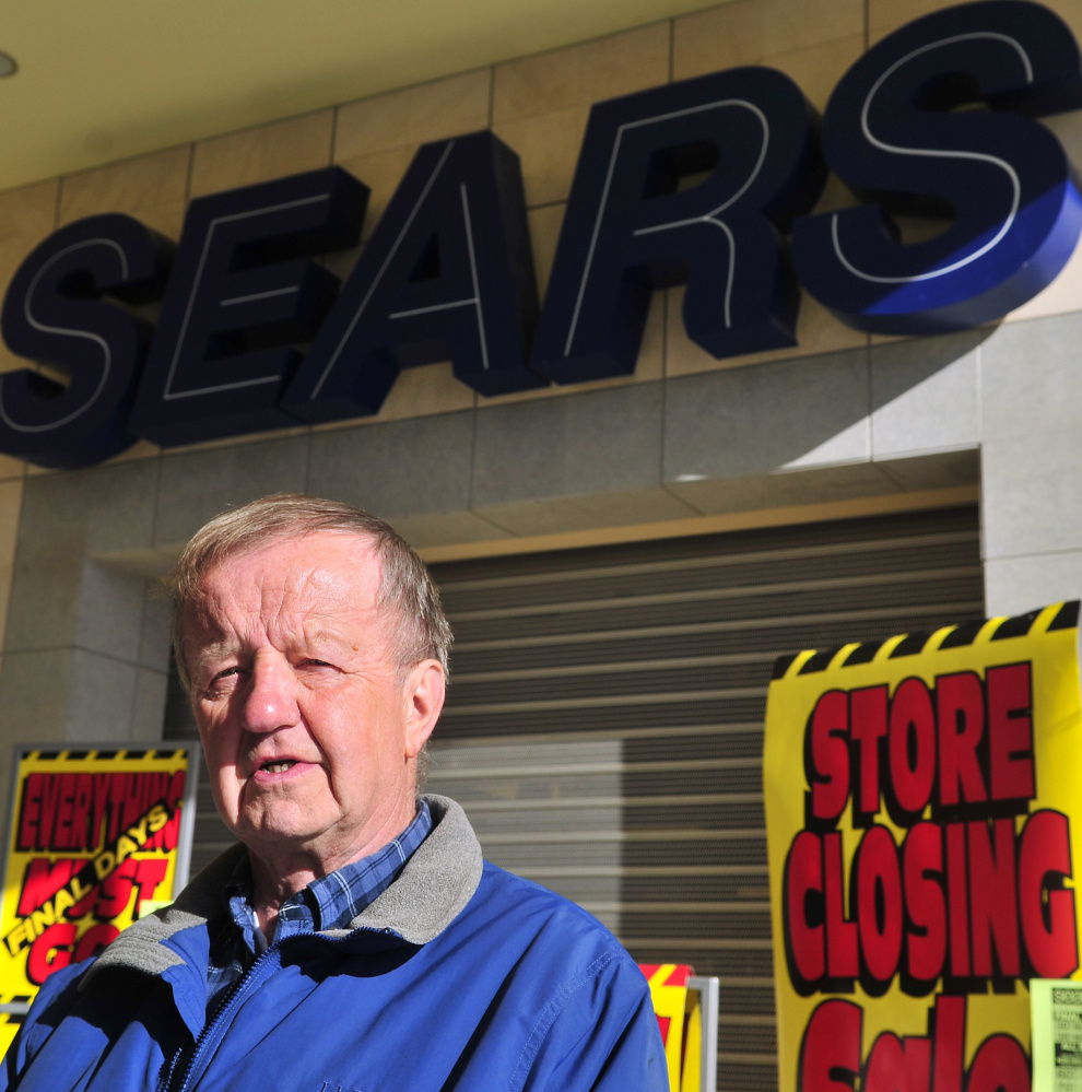 Former employee Cal Brown stands in front of the Sears in Augusta that will close this month, leaving regular Sears stores only in Bangor, Brunswick and South Portland.