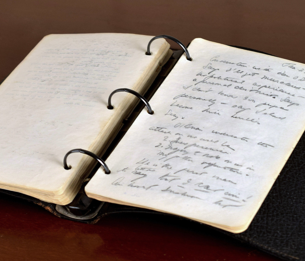 Photo released Thursday by RR Auction shows a portion of a diary written in 1945 by a young John F. Kennedy during his brief stint as a journalist after World War II.