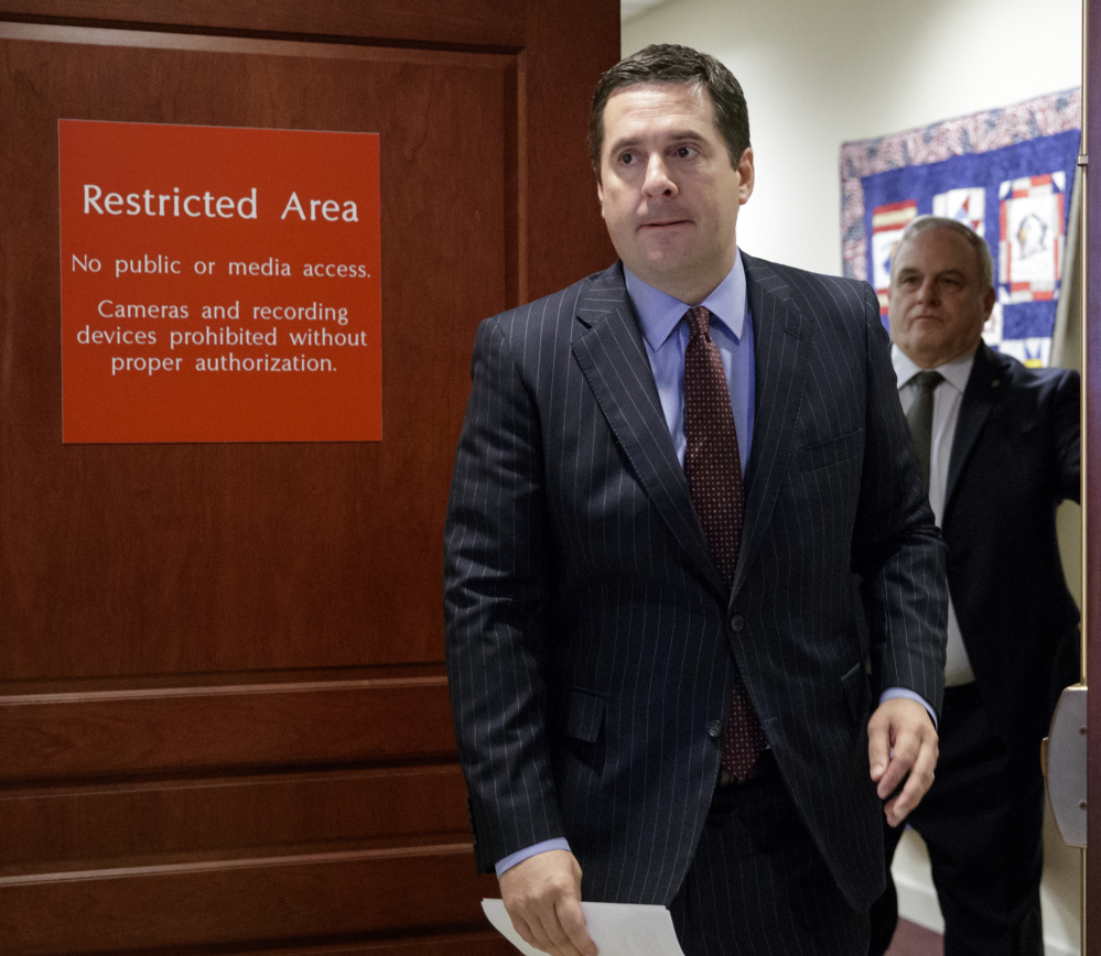 House Intelligence Committee Chairman Rep. Devin Nunes, R-Calif., arrives to update reporters about the Russian election interference probe in Washington on Thursday.