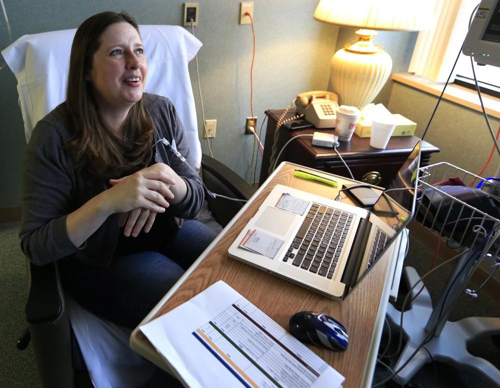 Janella Williams, 45, monitors action on the Obamacare replacement bill Friday as she watches news reports while receiving treatment for a neurological disorder at Lawrence (Kan.) Memorial Hospital. "I am thankful," she said later. "I hope that this makes (President) Trump the earliest lame duck ever."