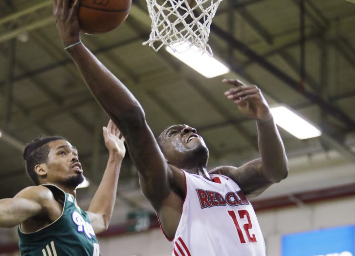 Maine's Jalen Jones goes up for a shot while being guarded by Reno's Will Davis II during the Red Claws' 125-118 loss Sunday. Jones had 25 points in Maine's last home game of the regular season.