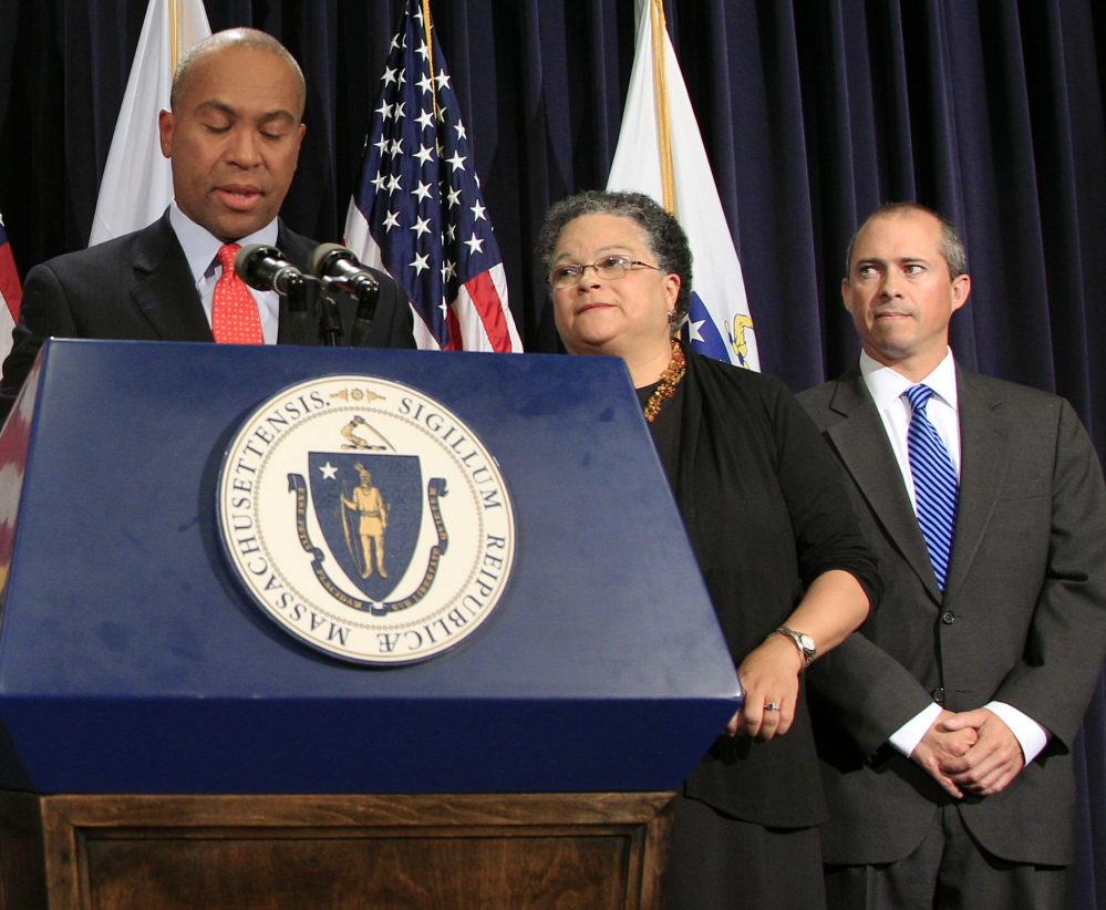 A member of former Massachusetts Gov. Deval Patrick's cabinet, Jay Gonzales, right, is the first major-party candidate to enter the 2018 governor race. Gonzalez faults Gov. Charlie Baker for underfunding key state programs and the "rainy day fund." Also pictured are Patrick and Health and Human Services Secretary JudyAnn Bigby in 2012.