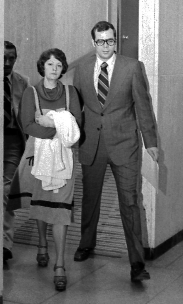 Francine Wilson, shown with defense lawyer Arjen Greydanus in Lansing, Mich., in 1977, was found not guilty by reason of temporary insanity in the death of her husband, James Hughes.