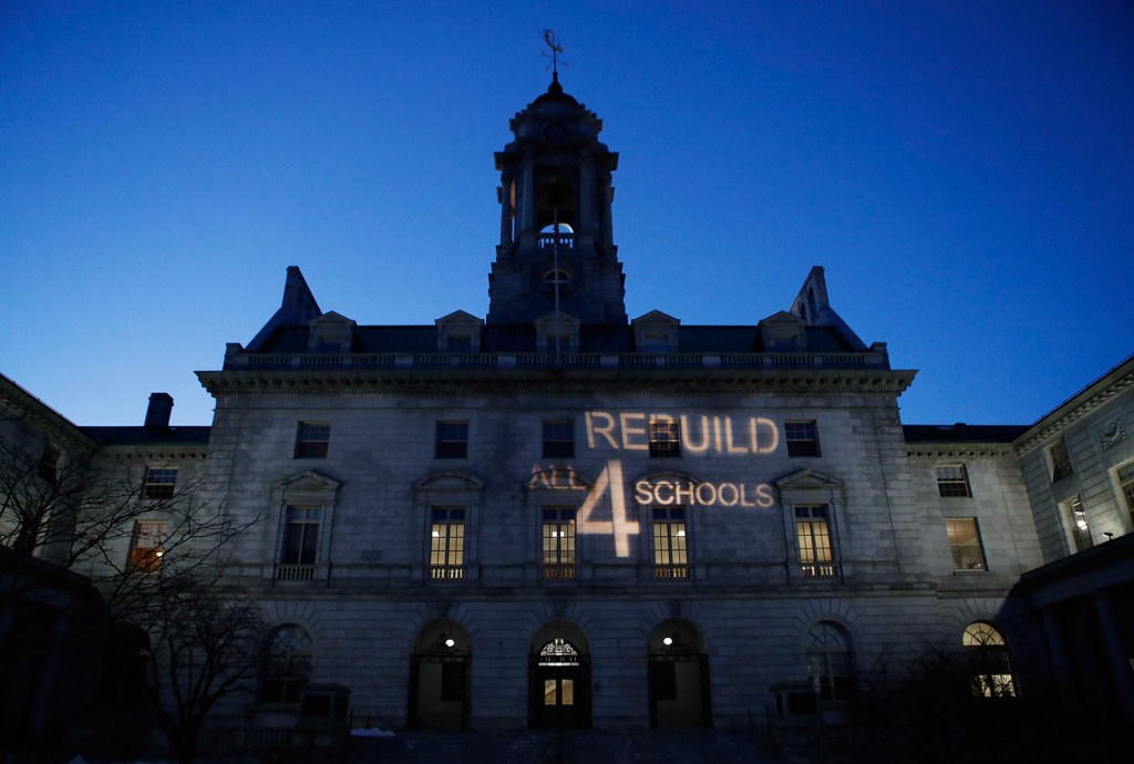 A light display aimed at encouraging city councilors to approve a $64 million school bond proposal was projected on Portland City Hall on March 20. The proposal fell one vote short as three councilors voted against it.