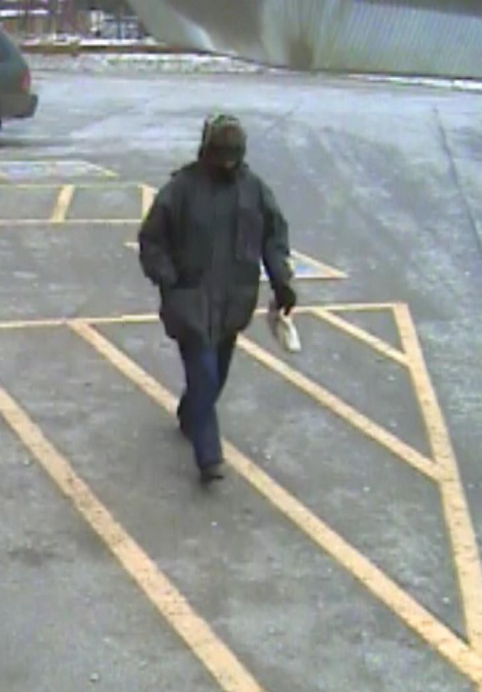 An image released by authorities of the so-called "Silent Bandit" who has been linked to four bank robberies in central Maine in recent years.