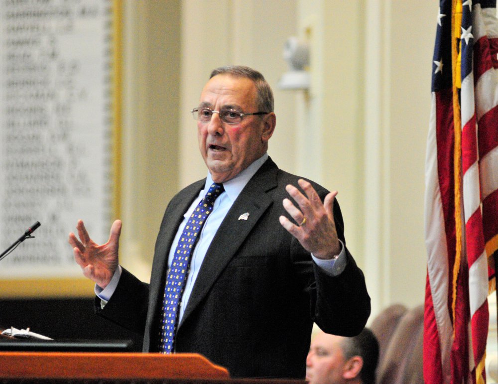 Gov. Paul LePage, shown here giving his State of State Address on Feb. 7 at the State House, is scheduled to be behind the bar Monday at the Quarry Tap Room in Hallowell as part of a charity event.
