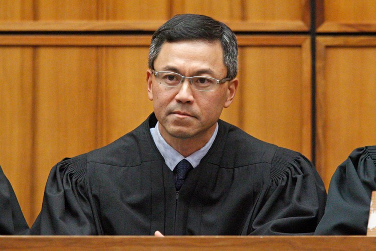 U.S. District Judge Derrick Watson: "The court will not crawl into a corner, pull the shutters closed, and pretend it has not seen what it has." 