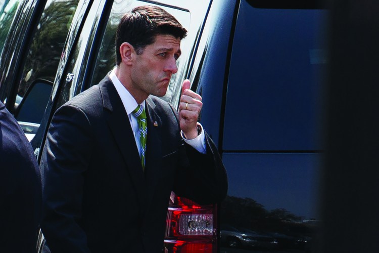House Speaker Paul Ryan of Wis. walks to his office  on Thursday as he and the Republican leadership scramble for votes on their health care overhaul.