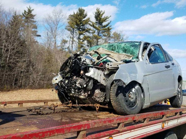 The driver of this car suffered serious injuries in a collision with a tractor-trailer around 12:30 p.m. at mile 40 southbound on the Maine Turnpike on Thursday.
