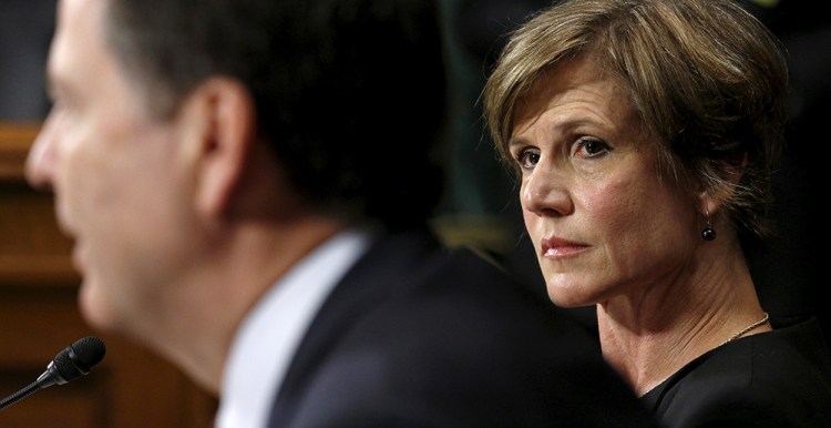 Deputy Attorney General Sally Yates listens as FBI Director James Comey speaks during a Senate Judiciary Committee hearing in 2015.  In January, Yates warned White House Counsel Don McGahn that statements made by White House officials about Michael Flynn's contacts with the Russian ambassador were incorrect, and could therefore expose the national security adviser to future blackmail by the Russians.