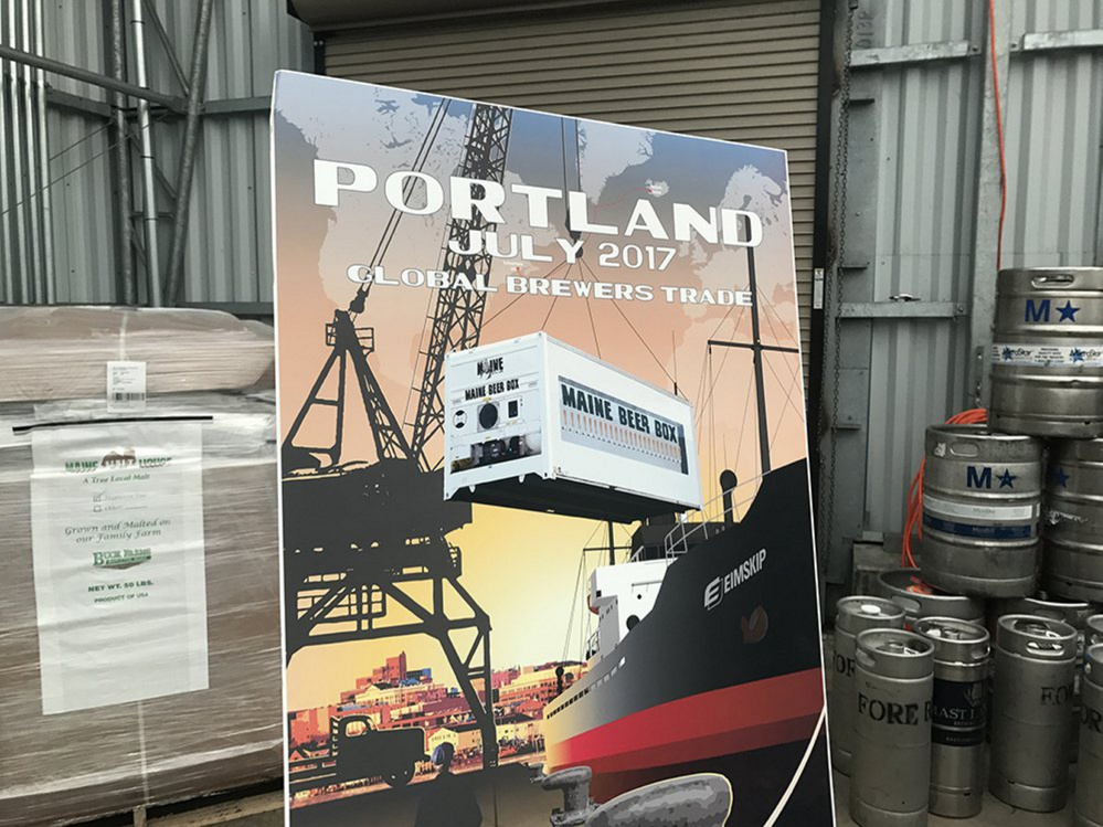 A poster on display Thursday at the Maine International Trade Terminal in Portland shows an artist's rendering of the Maine Beer Box that Icelandic shipping company Eimskip will transport from Maine to Iceland for a festival in June. "As far as we know, this is the first time an entire state's brewing community has come together to exchange beer with an entire country's beer brewers," said Sean Sullivan, executive director of the Maine Brewers' Guild. "This is setting a trend." 