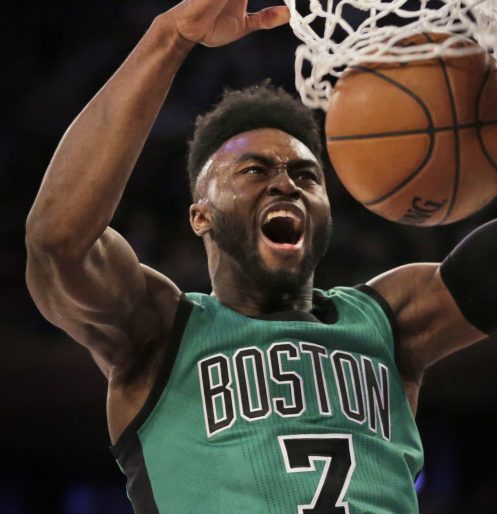 Jaylen Brown dunks for two of his 16 points Sunday during a 110-94 victory over the Knicks in New York. (Associated Press/Seth Wenig)