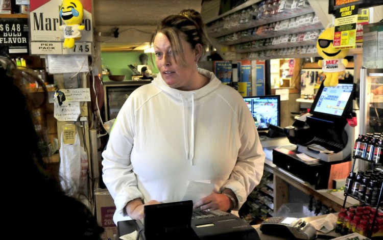 Patterson's Store cashier Angie Huff said the unusual circumstances in the death of neighbor Joyce Wood on Sunday and lack of information about the incident were on the minds of customers coming into the Burnham store all day Monday.