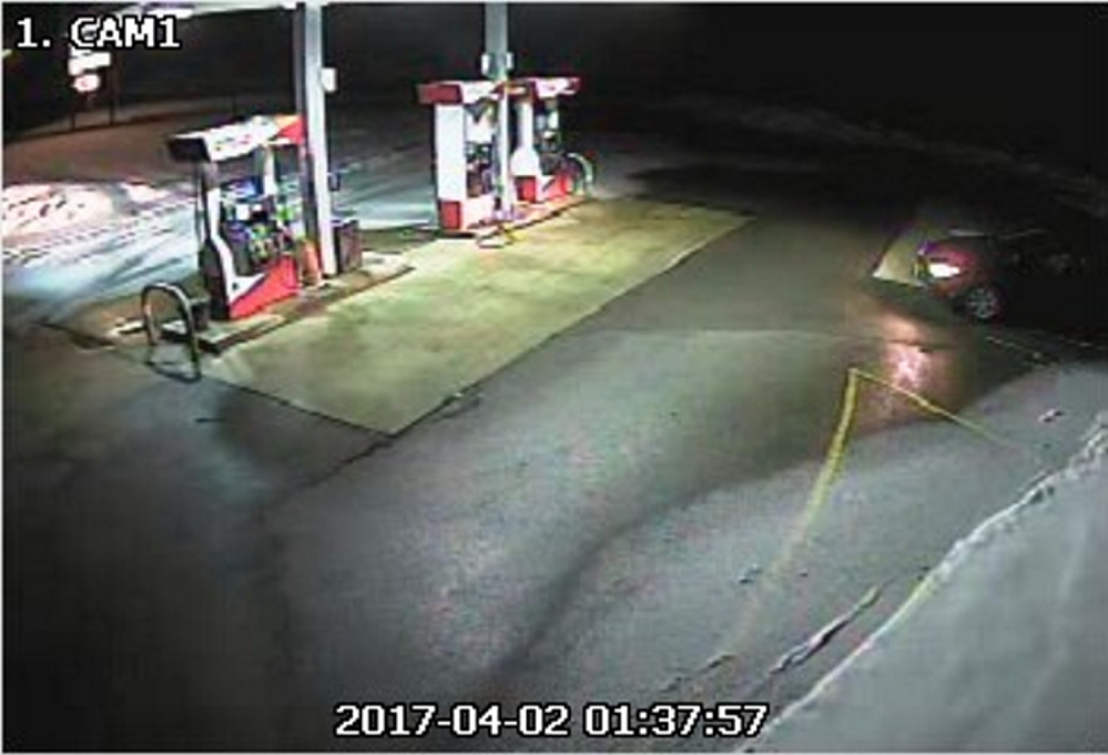 A surveillance photo from Annie's Market in Sidney shows a blue car that police think was driven by the man who damaged the convenience store early Sunday morning.