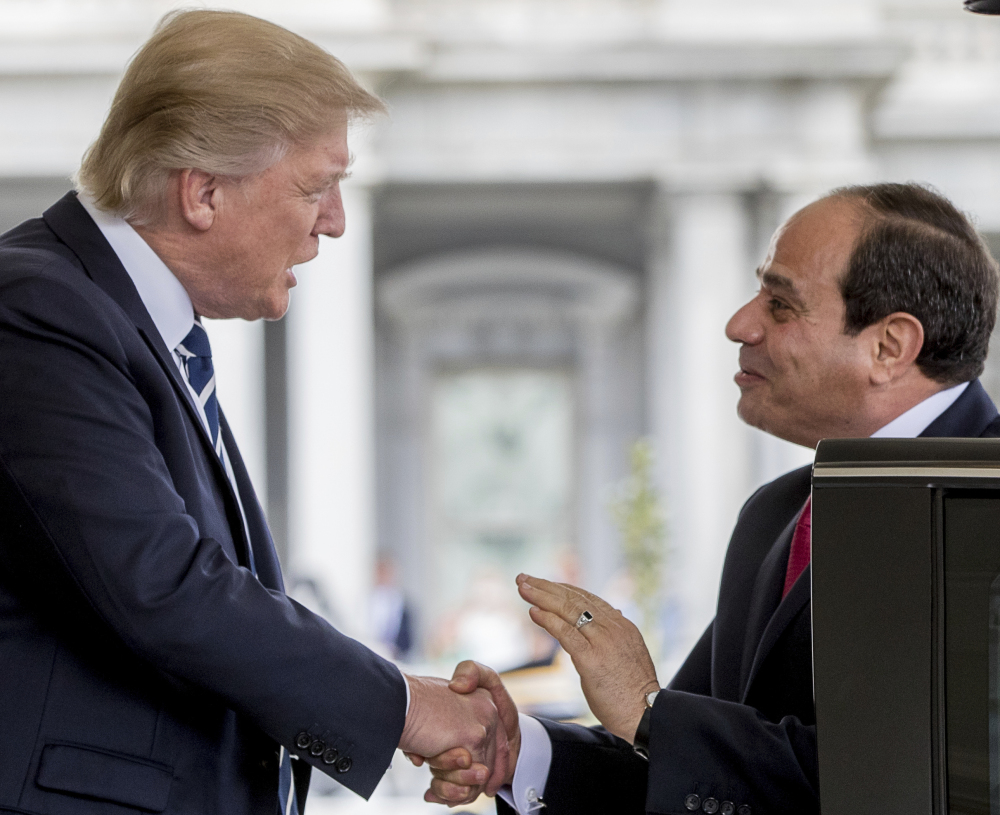President Trump greets Egyptian President Abdel-Fattah el-Sissi as he arrives for a state visit at the White House in Washington on Monday.