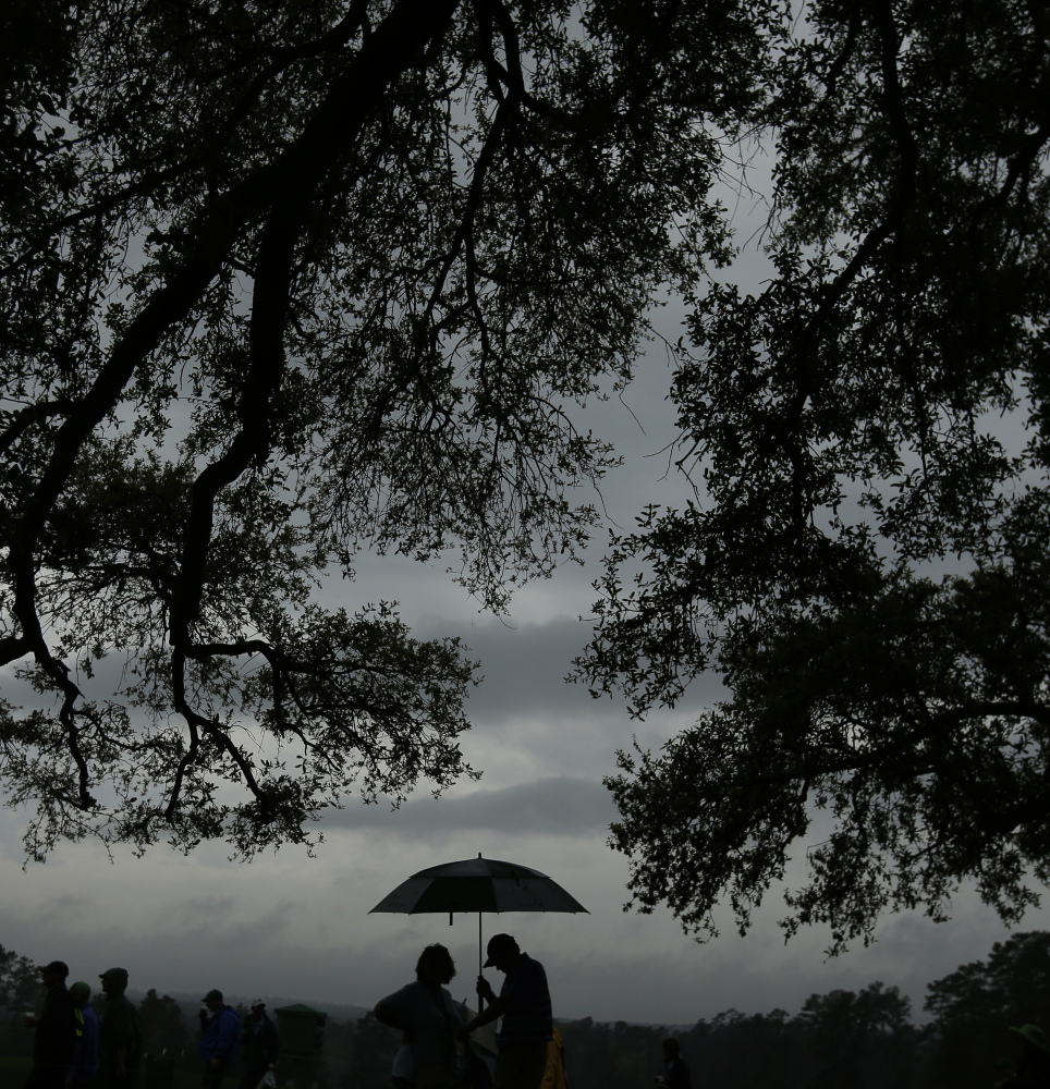 Wednesday was a day for huddling under an umbrella at Augusta National as fans braved the elements to check out the fun at the Par 3 competition. The serious stuff starts Thursday with the opening round of the Masters.
