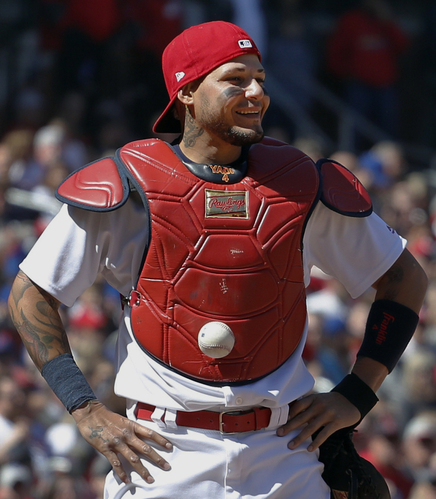 St. Louis catcher Yadier Molina couldn't find the ball after a pitch in the dirt Thursday, and no wonder. It was stuck to his chest protector. The batter reached on the third strike, leading to a Cubs comeback for a 6-4 victory.