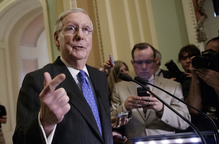 Senate Majority Leader Mitch McConnell, R-Ky., speaks to reporters Tuesday about the Republican plan to enact a unilateral rules change to eliminate the filibuster for Supreme Court nominees.