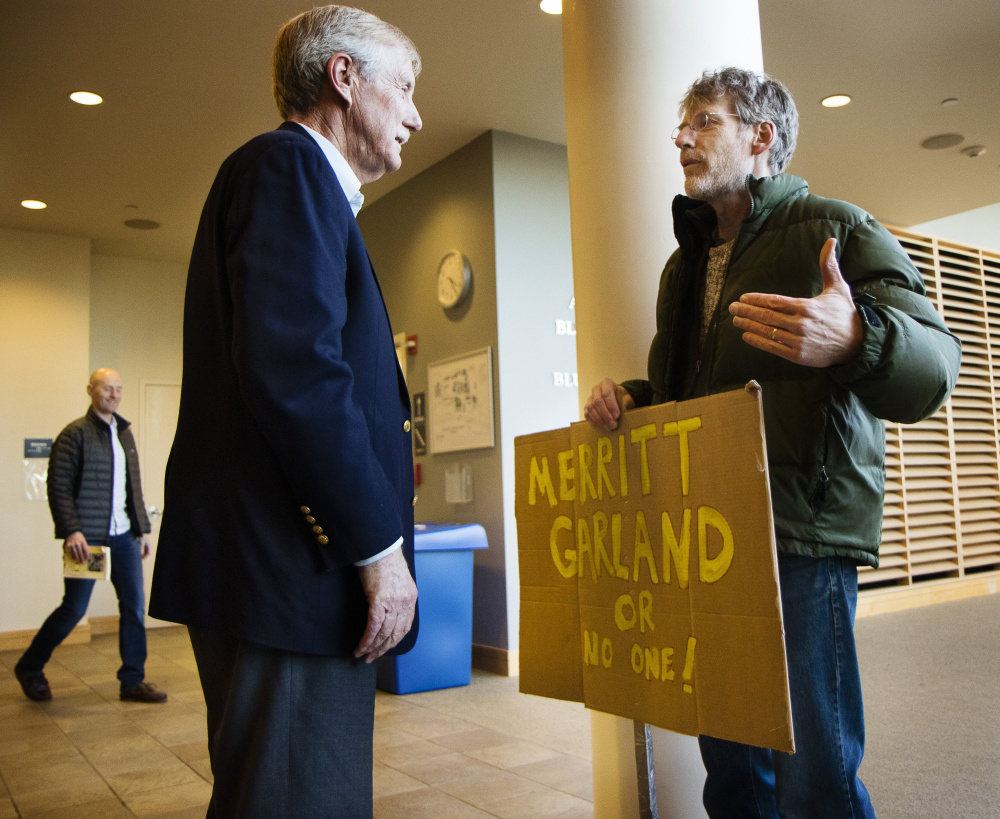 Sen. Angus King of Maine talks with David Simpson of Peaks Island before a March 5 town hall meeting on Neil Gorsuch's nomination to the U.S. Supreme Court. King's independent status was nowhere to be seen when he followed Democrats in opposing the court nominee, a reader says.