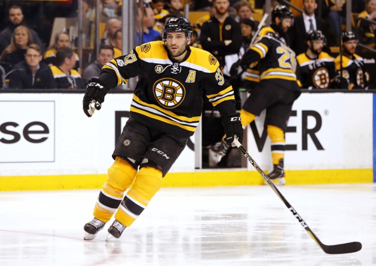 The Bruins' Patrice Bergeron skates in the second period of Saturday's game against the Washington Capitals in Boston – a loss to finish the regular season.